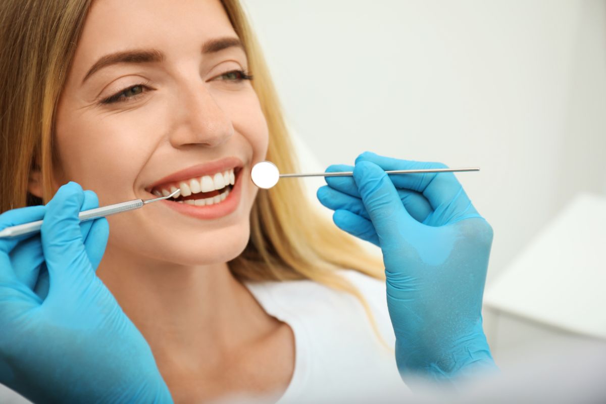 Female patient receiving modern cosmetic dental care
